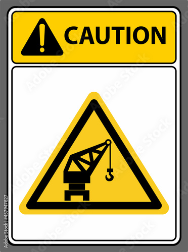 Be careful, the crane is working.,Caution sign.