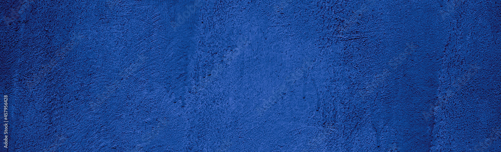 Wall texture. Blue concrete wall. Background image for product layout. Wall texture. Blue concrete wall. Background image for product layout.