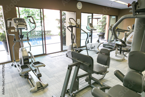 Modern gym interior with equipment. fitness center interior