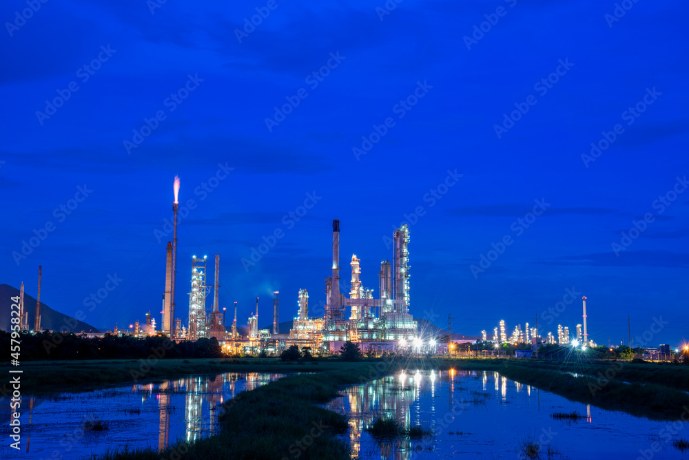 Oil refinery gas petrol plant industry with crude tank, gasoline supply and chemical factory. Petroleum barrel fuel heavy industry oil refinery manufacturing factory plant. Refinery industry concept Oil refinery gas petrol plant industry with crude tank, gasoline supply and chemical factory. Petroleum barrel fuel heavy industry oil refinery manufacturing factory plant. Refinery industry concept