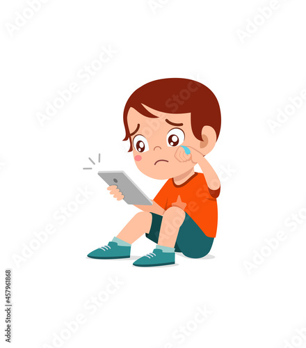 little boy using mobile phone and cry