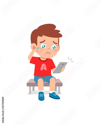 little boy using mobile phone and cry