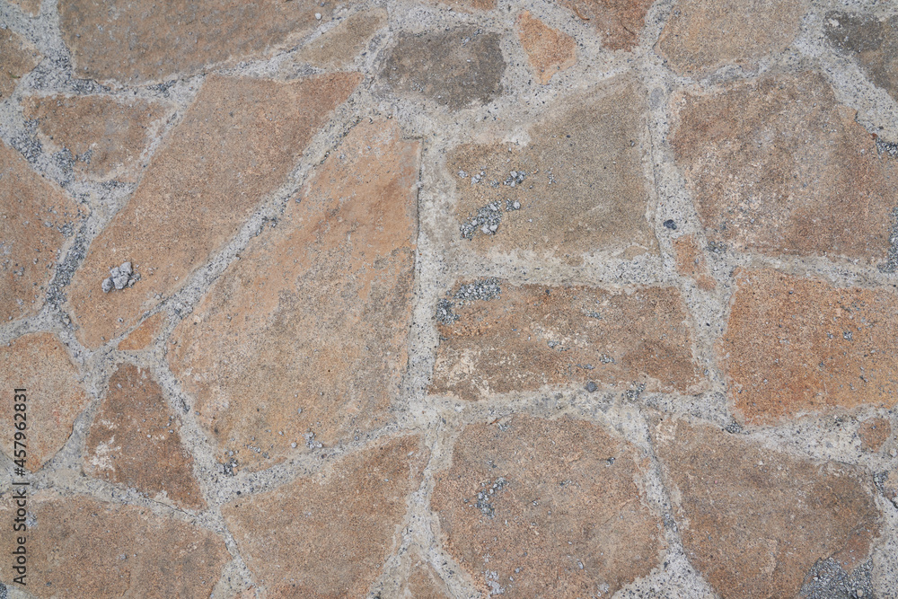 Orange old stone road surface. Seamless Texture. The texture of a stone road. High quality photo Orange old stone road surface. Seamless Texture. The texture of a stone road. High quality photo