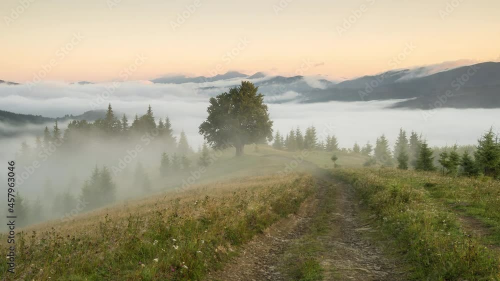 Time lapse of the morning fog covering valley in Carpathian mountains, Ukraine