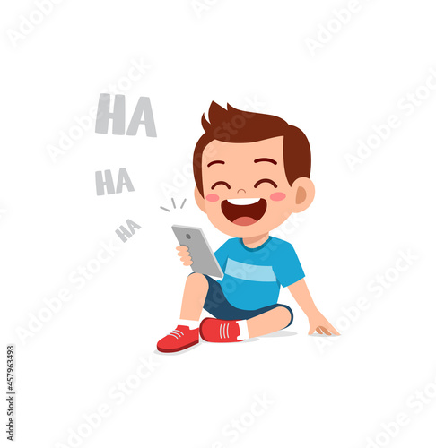 little boy using mobile phone and laugh