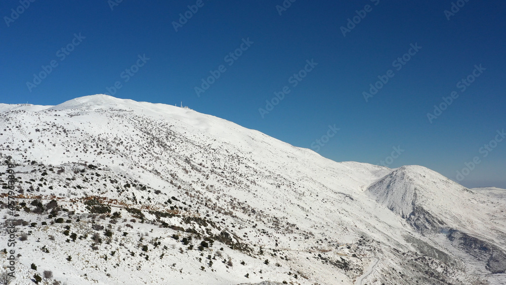 Hermon Mountain in the snow, aerial view
Drone view from North Israel in the winter at sunset, 2021
