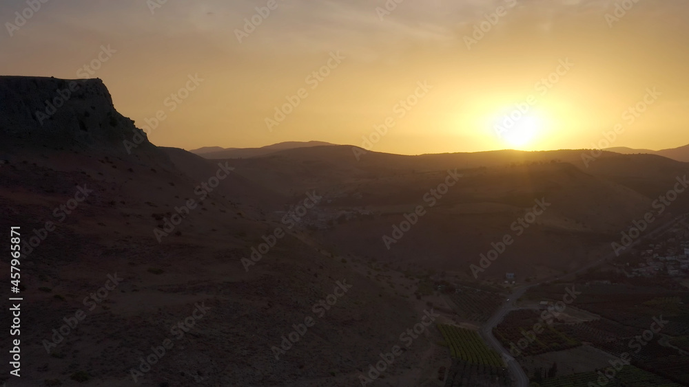 Small town surrounded By desert Cliffs at sunset
Desert Cliff at sunset done view

