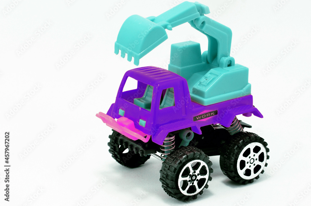 Toy construction truck isolated on white background Toy construction truck isolated on white background