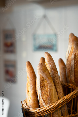 Baguettes in a bakery in a rattan basket