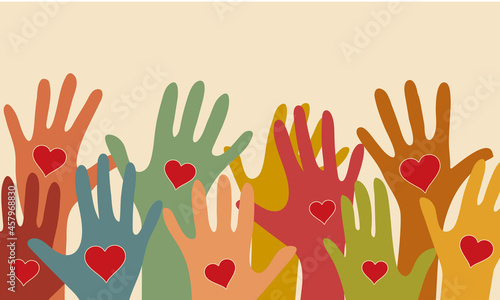The background of the silhouette of multicolored hands with hearts in their palms, the concept of diversity, volunteering.