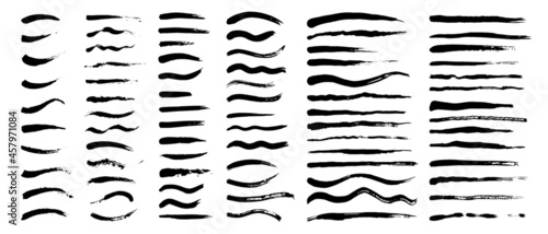 Vector set of grunge artistic brush strokes, brushes. Creative design elements. Long, short, edged black lines.
