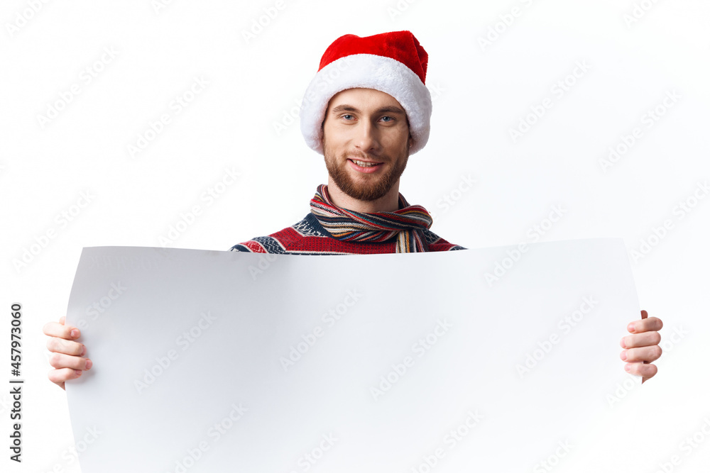 emotional man in New Year's clothes holding a banner holiday isolated background emotional man in New Year's clothes holding a banner holiday isolated background