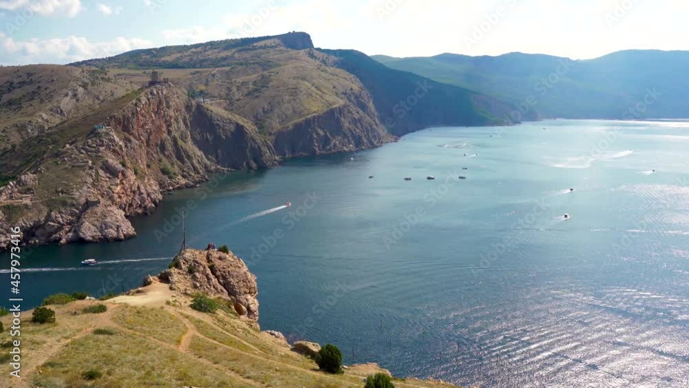 4k video. View of yachts and boats in the bay in Balaklava from the hill. Panoramic video of Crimea in summer. 4k video. View of yachts and boats in the bay in Balaklava from the hill. Panoramic video of Crimea in summer.