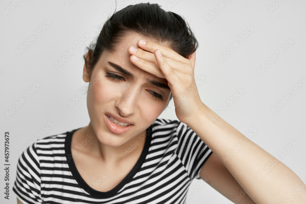 sick woman holding his head migraine depression light background sick woman holding his head migraine depression light background