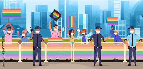 mix race people in masks with LGBT placards on lesbian gay pride festival transgender love LGBT community concept