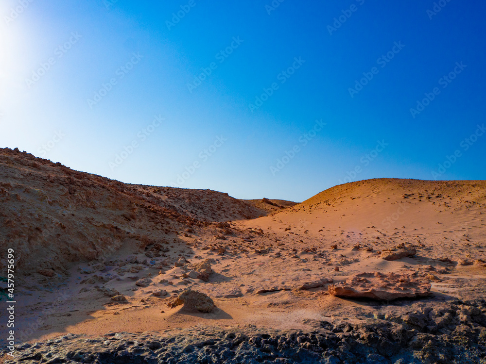 Naklejka premium Beautiful Egyptian desert. Blue sky and sand. Marsa Alam