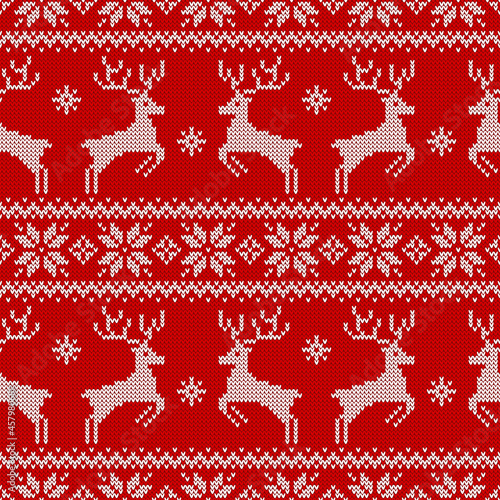 Knitted scandinavian seamless pattern with deers. Vector background.