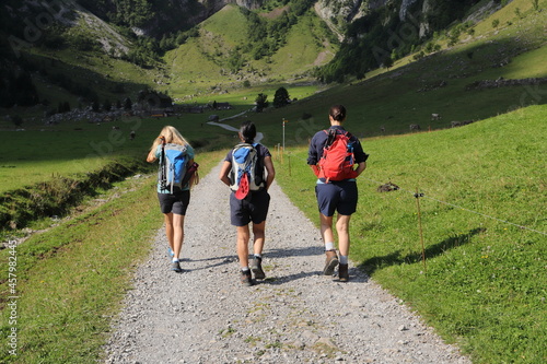 three friends hiking in switzerland  © maho