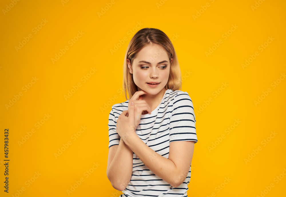 beautiful woman in striped t-shirt emotions studio fun beautiful woman in striped t-shirt emotions studio fun