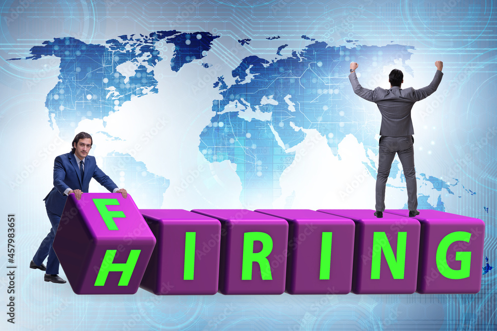 Hiring and firing concept with turning cubes Hiring and firing concept with turning cubes