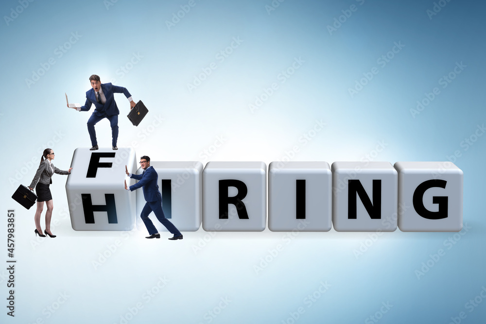 Hiring and firing concept with turning cubes Hiring and firing concept with turning cubes
