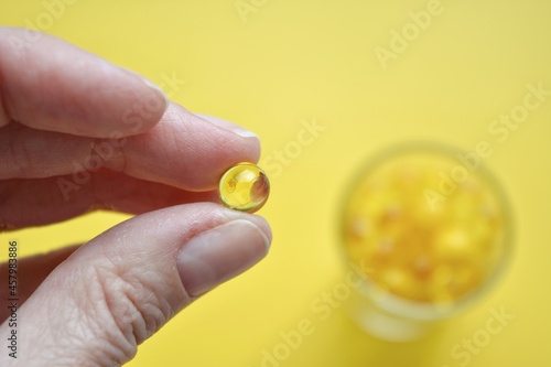 pills oil in hand