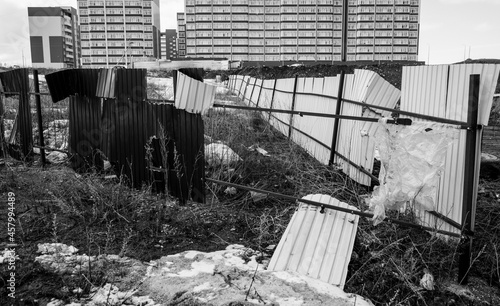 Destroyed fence and new apartment buildings. New residential area. Modern architecture. Black and White. Ust-Kamenogorsk (kazakhstan) photo