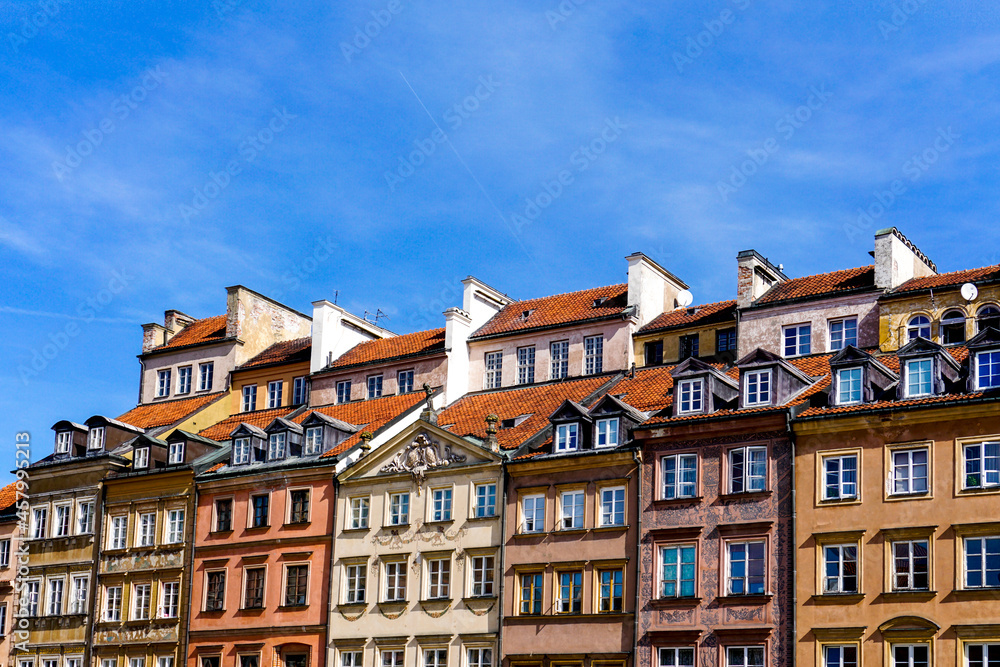 the colorful houses on the old market square in the historic city center of Warsaw