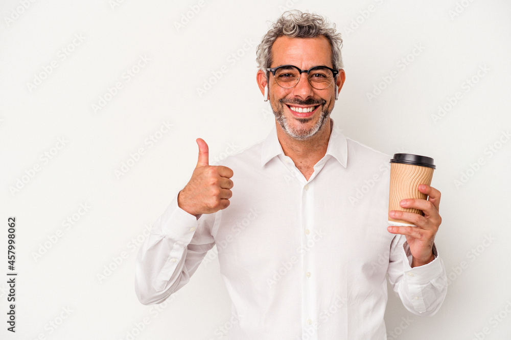 Middle age business man holding a take away coffee isolated on white background smiling and raising thumb up Middle age business man holding a take away coffee isolated on white background smiling and raising thumb up