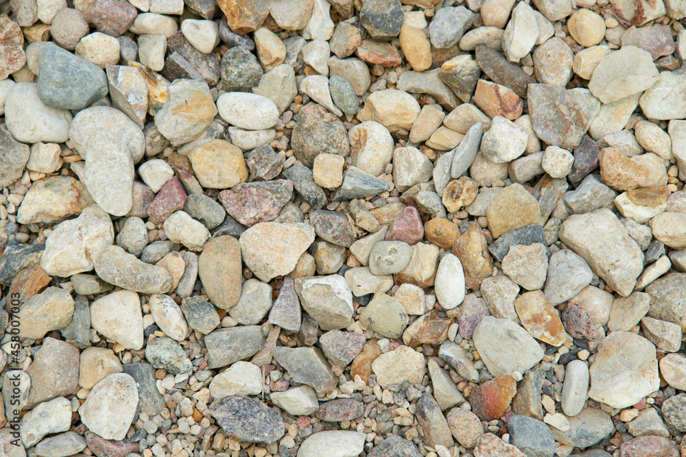 Natural colorful pebble stones background texture with copy space. Natural colorful pebble stones background texture with copy space.