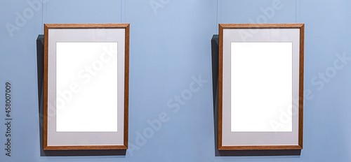 Two empty gallery mock up two frame in interior blue wall photo