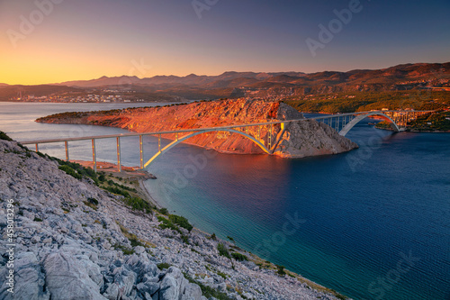 Obraz na płótnie Krk Bridge, Croatia. Image of Krk Bridge which connects the Croatian island of Krk with the mainland at beautiful summer sunset. w salonie