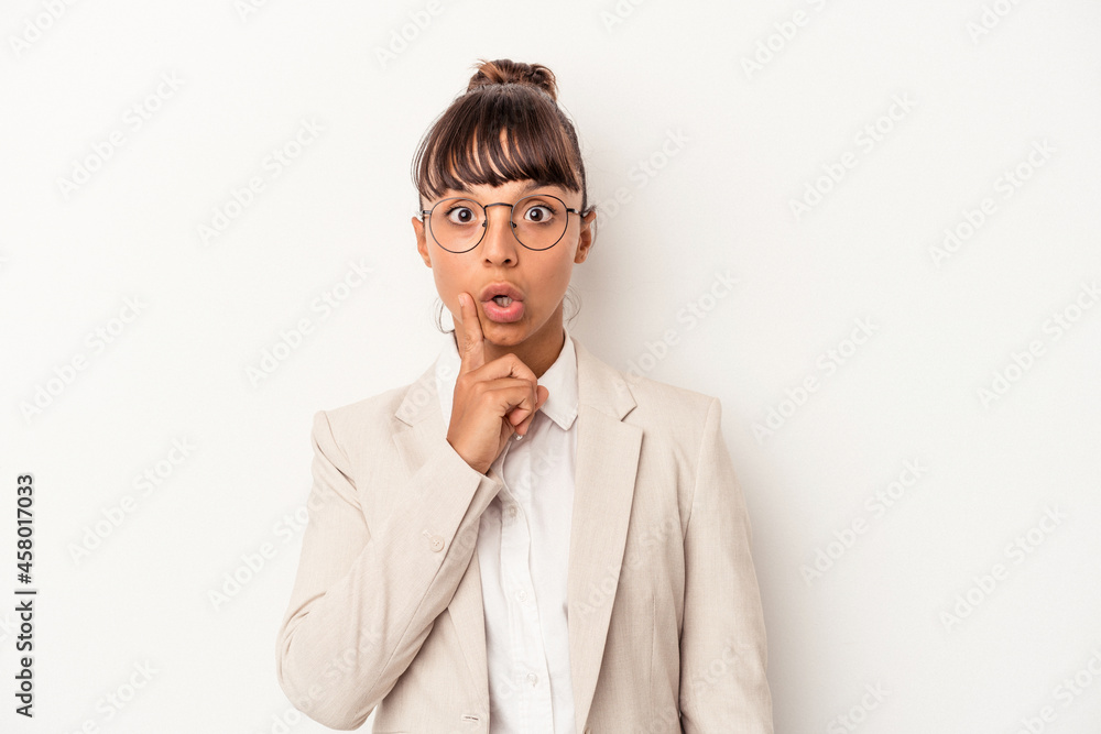 Young mixed race woman isolated on white background  having some great idea, concept of creativity.