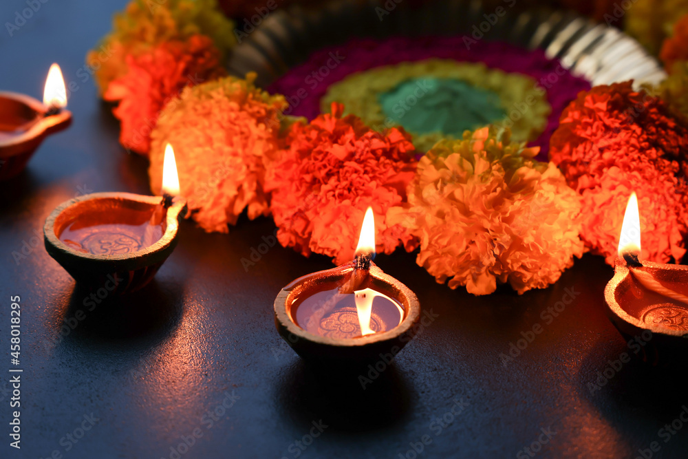 Diwali celebration Indian festival of lights Diya oil lamp and colors ...