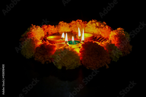 Photography Diwali celebration Indian festival of lights Diya oil lamp and colors Rangoli de