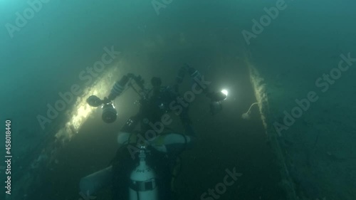 Wallpaper Mural Scuba diver photographer shots inside of the shipwreck. Wreck diving in Mediterranean sea, Limassol, Cyprus
 Torontodigital.ca