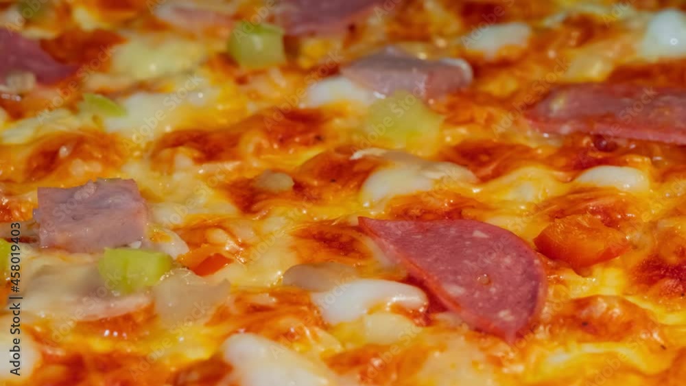 Timelapse - pizza with sausage, ham, pepper, cheese baking on tray in electric oven in kitchen at home - close up view. Italian cuisine, homemade bakery, fast food, cooking and time lapse concept Timelapse - pizza with sausage, ham, pepper, cheese baking on tray in electric oven in kitchen at home - close up view. Italian cuisine, homemade bakery, fast food, cooking and time lapse concept
