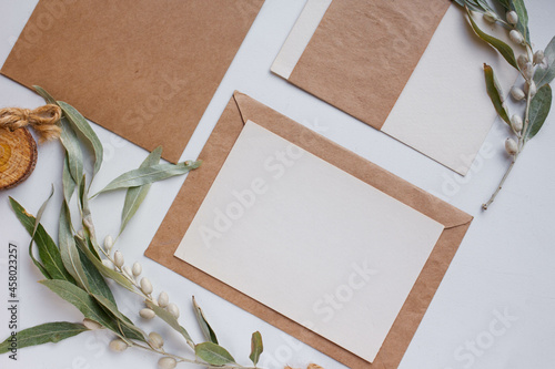 wedding invitation mockup  with decor and leaves. 