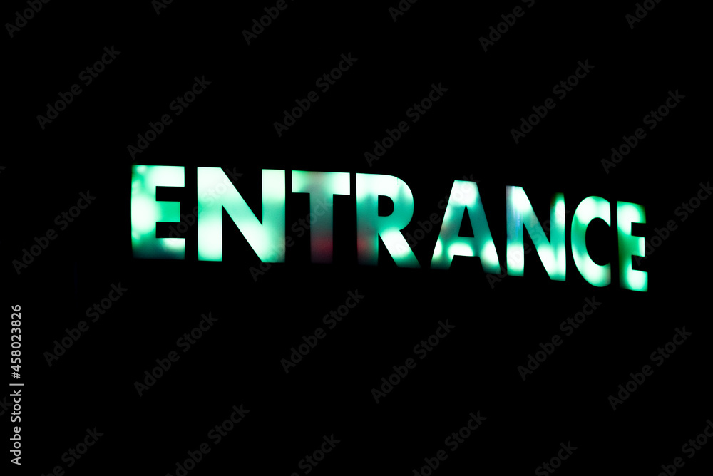 Fototapeta premium Colorful neon sign of entrance