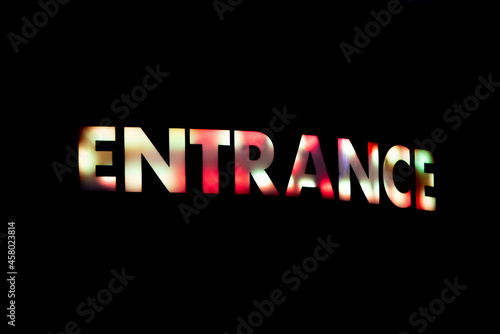 Colorful neon sign of entrance