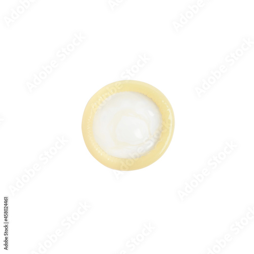 Unpacked beige condom isolated on white, top view. Safe sex © New Africa