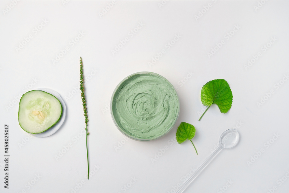 Handmade organic bio nature cosmetics with herbal ingredients on gray background. Natural beauty and spa concept. Space for text Handmade organic bio nature cosmetics with herbal ingredients on gray background. Natural beauty and spa concept. Space for text