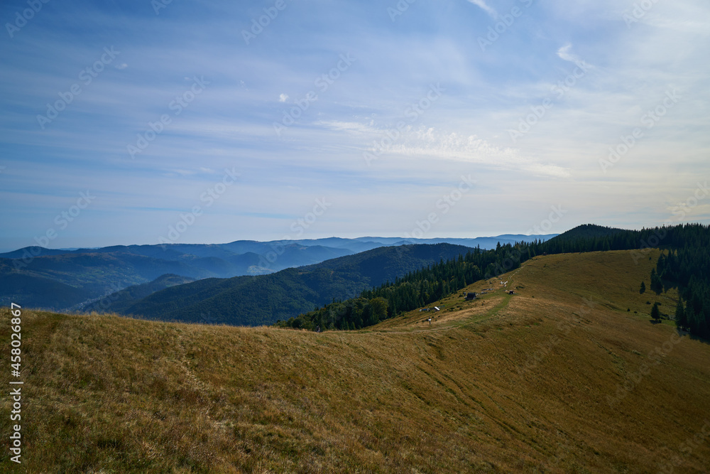 Beautiful views from the hiking trail in the Carpathian mountains. Leisure and recreation in the open air. Conquering the hills.