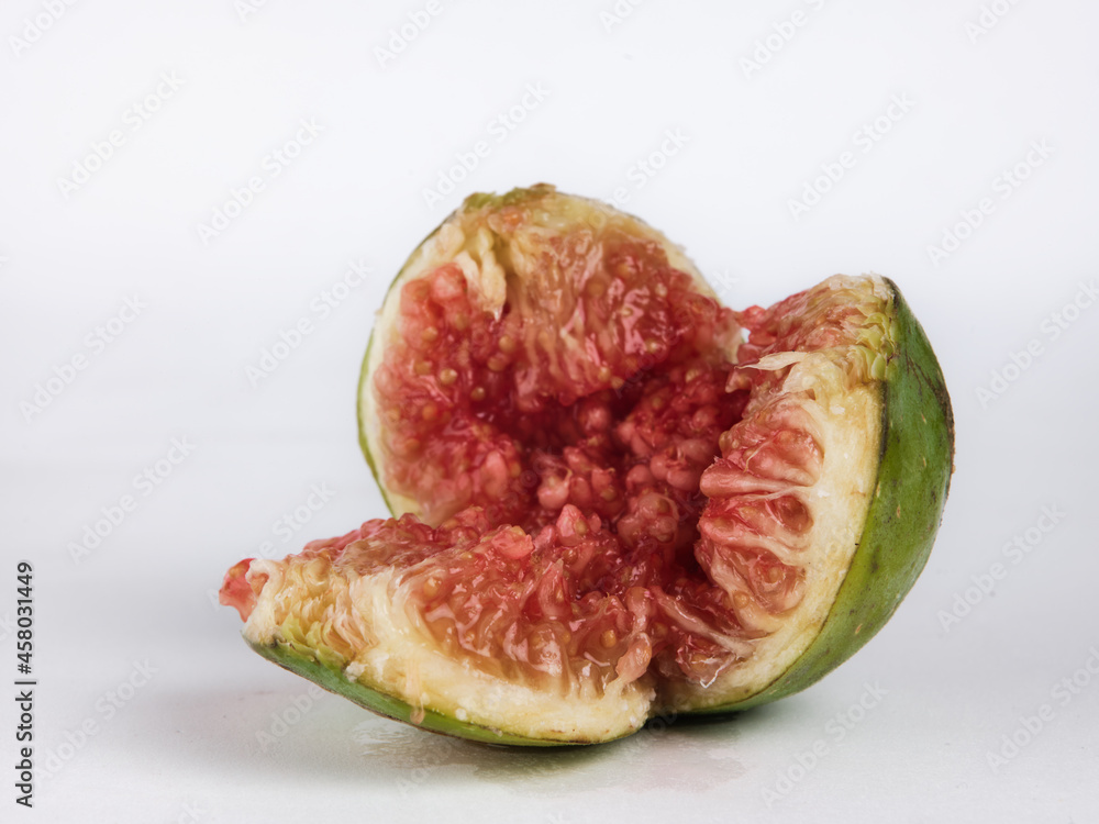 Ripe green fig fruit isolated on white background