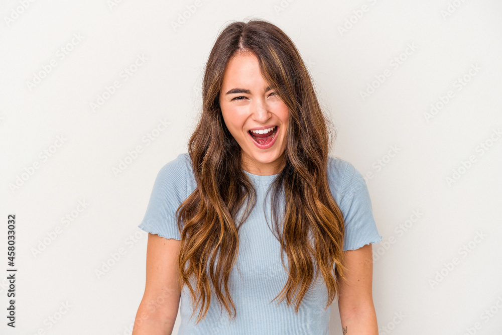 Young caucasian woman isolated on white background shouting very angry, rage concept, frustrated. Young caucasian woman isolated on white background shouting very angry, rage concept, frustrated.