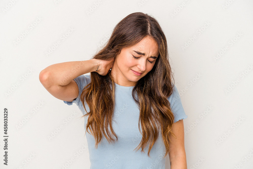 Young caucasian woman isolated on white background suffering neck pain due to sedentary lifestyle. Young caucasian woman isolated on white background suffering neck pain due to sedentary lifestyle.