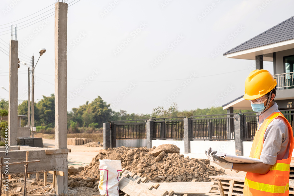The construction site male engineer or architect is exploring and inspecting the outdoor construction site work The construction site male engineer or architect is exploring and inspecting the outdoor construction site work