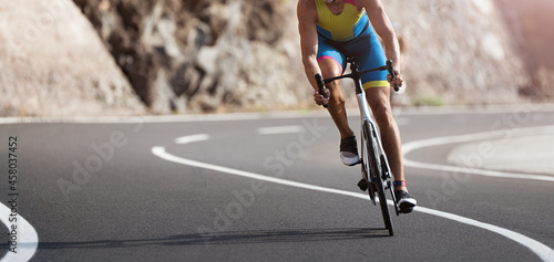 Road bike cyclist man cycling, athlete on a race cycle