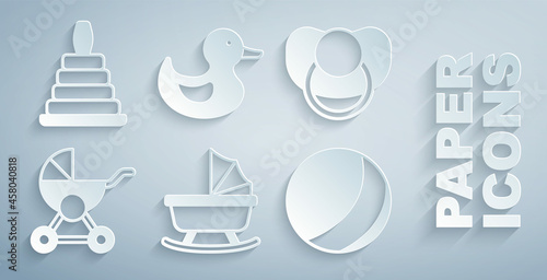 Set Baby stroller, dummy pacifier, Beach ball, Rubber duck and Pyramid toy icon. Vector