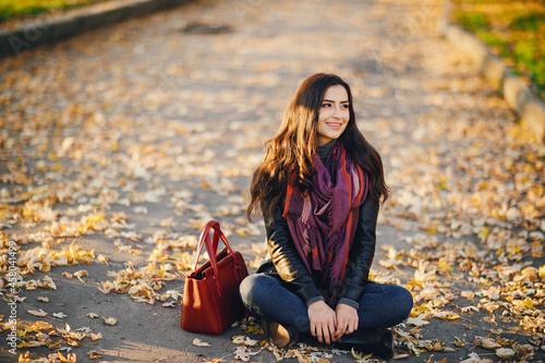 brunette girl relaxing at the park